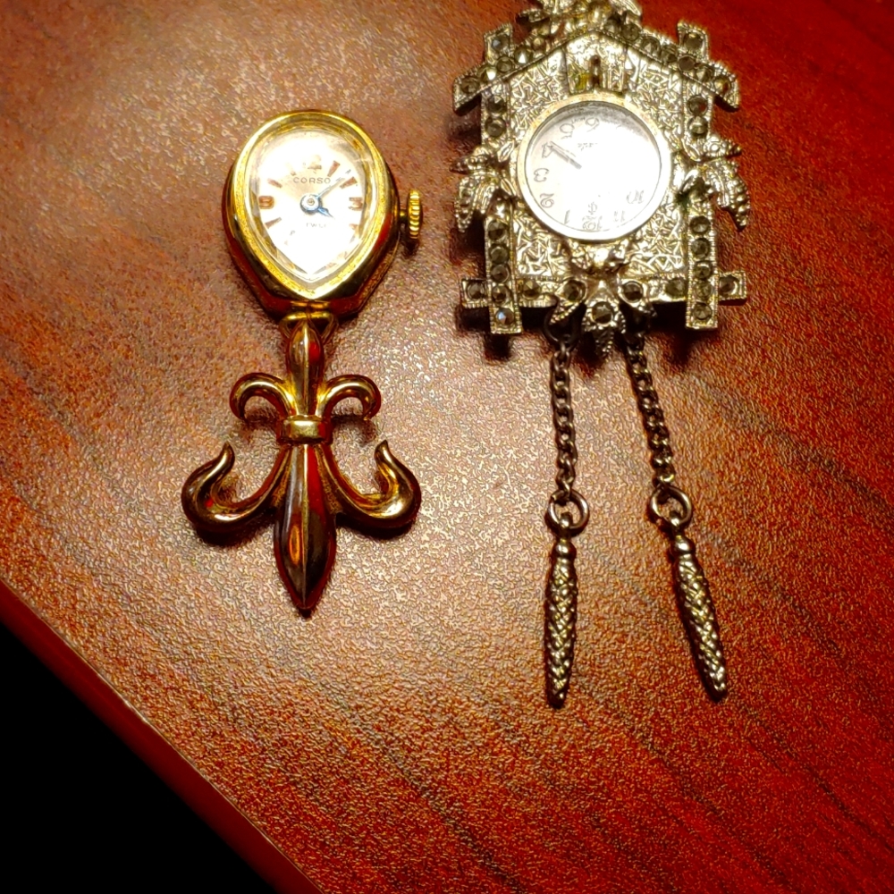 Two vintage pendant or pin watches